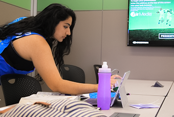 woman looking at her laptop